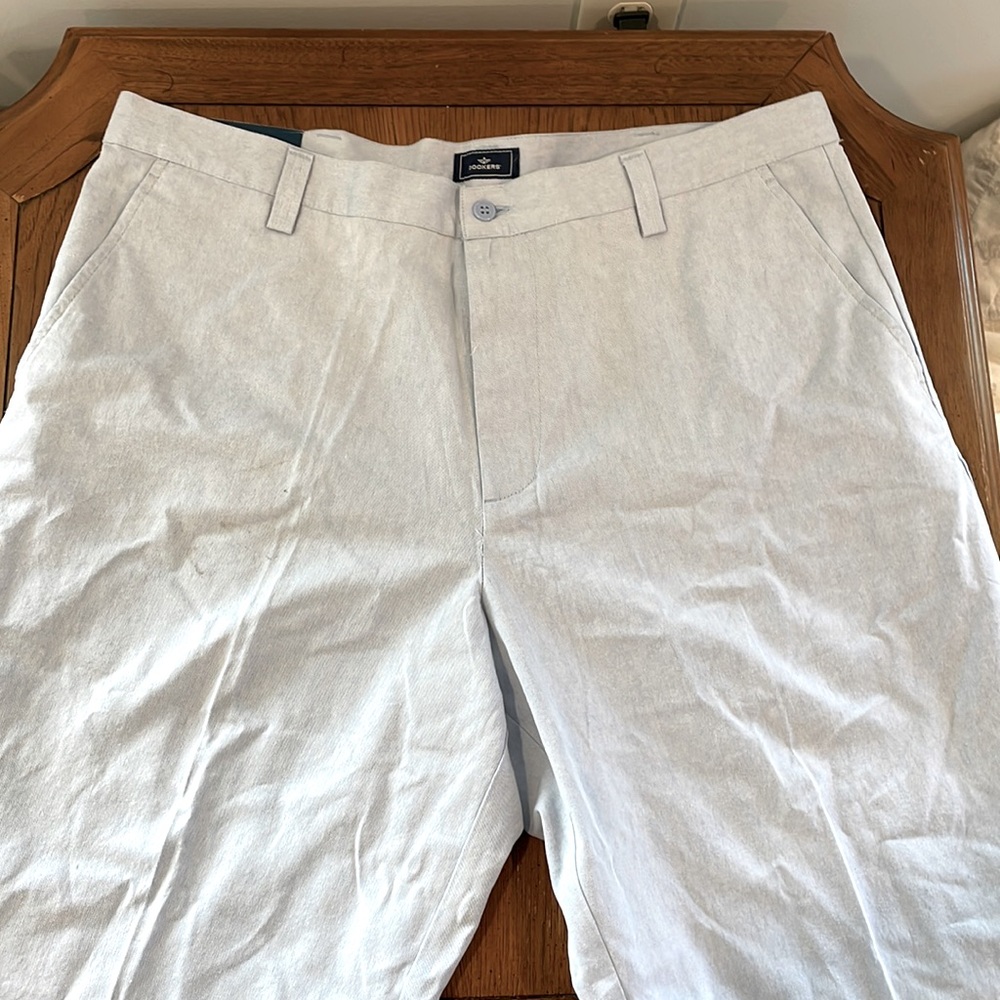 Men’s 100% cotton chinos. Light blue color. Flat Front, relaxed fit.